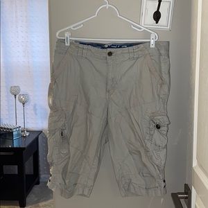 Beige colored shorts with side pockets